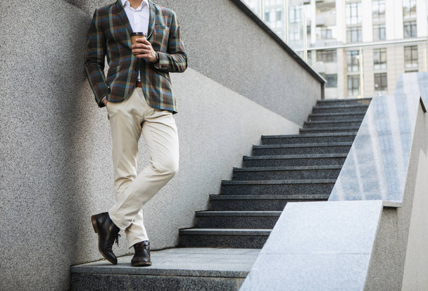Man in fashionable suit having coffee break - Zdjęcie, obraz