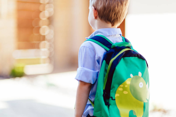 Child leaving home to his first day of kindergarten - Photo, Image