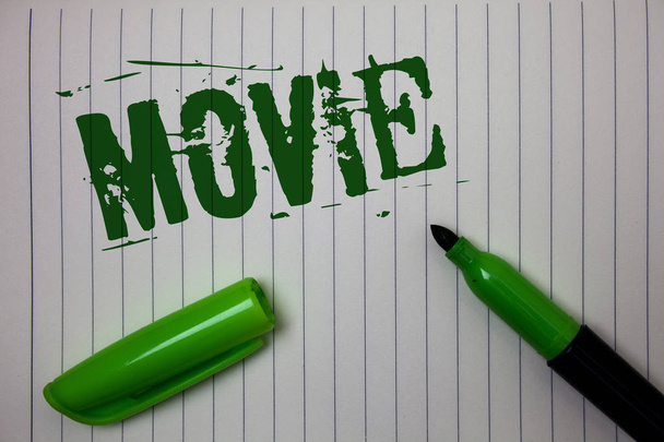 Handwriting text Movie. Concept meaning Cinema or television film Motion picture Video displayed on screen Linned paper background pen cap marker highlighter ink green drawing - Photo, Image