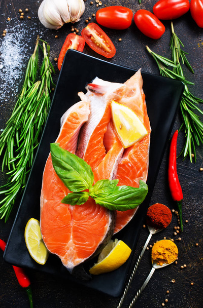 raw salmon steak with salt and ingredients  - Photo, Image