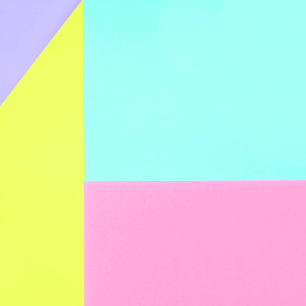 De achtergrond van de textuur van mode pastel kleuren. Roze, violet, geel en blauw geometrische patroon papers. minimale abstract. - Foto, afbeelding