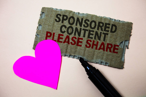Text sign showing Sponsored Content Please Share. Conceptual photo Marketing Strategy Advertising Platform Brown paperboard rough ideas message heart wild love lovely intentions - Photo, Image