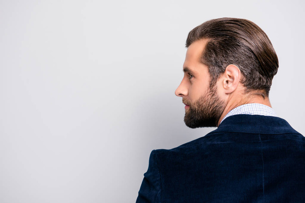 Profile half-faced side view portrait of handsome luxurious attractive stylish modern authoritative dreamy professional elegant entrepreneur, dark blue blazer isolated on gray background copy-space - 写真・画像