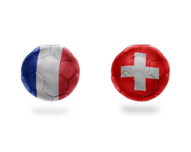 футбольні м'ячі з національними прапорами Франції та Швейцарії. ізольовані на білому тлі. 3D ілюстрація
 - Фото, зображення