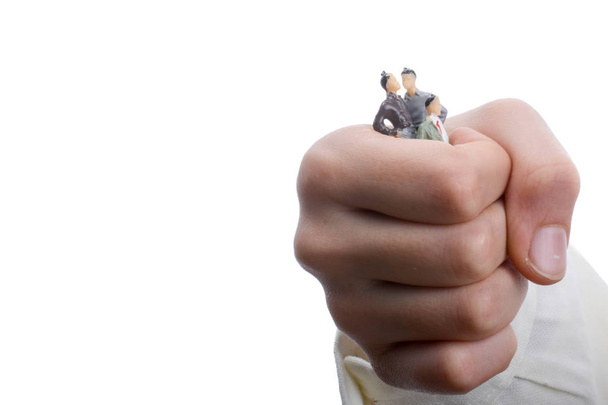 figurine model men in hand on a white background - Photo, Image