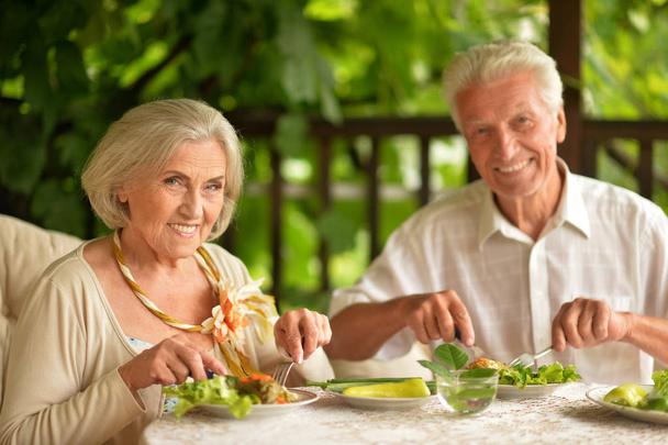 Happy Senior couple having diner - Fotografie, Obrázek