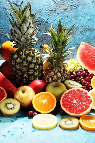 Fresh organic fruits background. Healthy eating concept. Flat lay. - Photo, Image