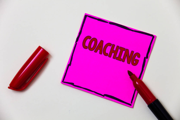 Conceptual hand writing showing Coaching. Business photo showcasing Prepare Enlightened Cultivate Sharpening Encourage Strenghten Pink note open marker communicate feelings things to do - Photo, Image