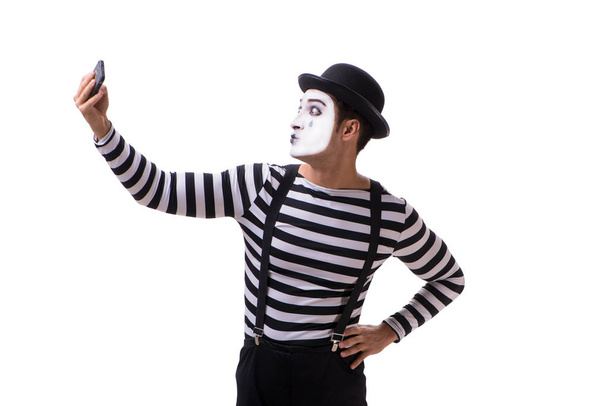 Mime mit Smartphone isoliert auf weißem Hintergrund - Foto, Bild