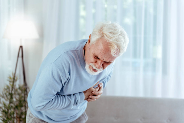 Ill senior man feeling pain in chest - Foto, Imagem