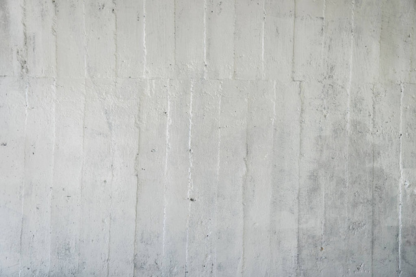 Grungy white concrete wall background. White cement wall texture used as background for message. - Фото, зображення