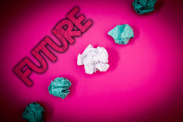 Conceptual hand writing showing Future. Business photo text Period of time following the present moment Events that will happen Ideas messages pink background crumpled papers several tries - Photo, Image