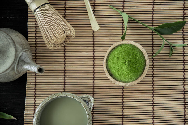 Top view of Organic Green Matcha Tea on bamboo napkin. - Foto, Imagen