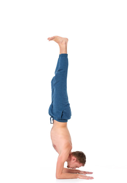 Young man practicing yoga. Yoga. Yoga Instructor. - Photo, Image