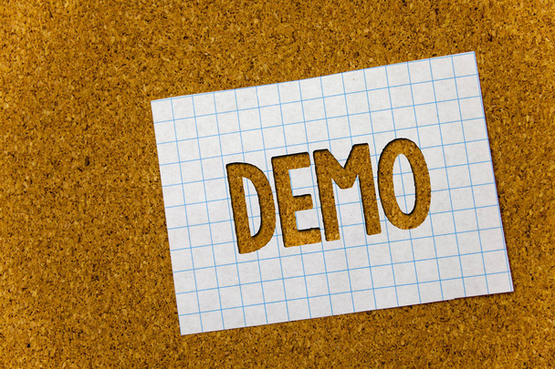 Text sign showing Demo. Conceptual photo Trial Beta Version Free Test Sample Preview of something Prototype Cork background notebook paper ideas messages thoughts to do list remember - Photo, Image