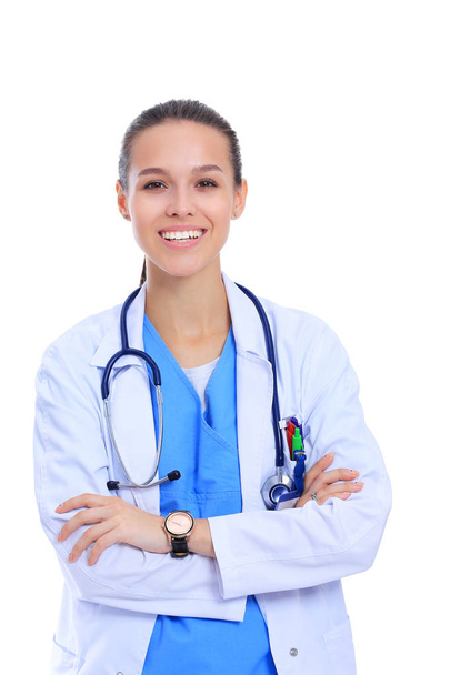 Beautiful young woman in white coat posing with hand in pocket. Woman doctor - Foto, Bild