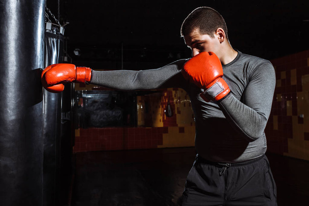 Boxer hits a speed bag in the gym - Zdjęcie, obraz