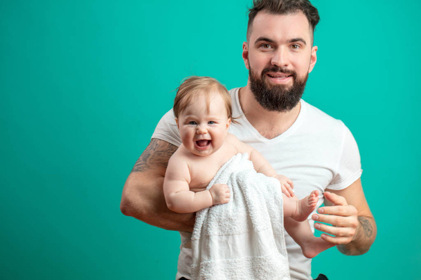 Young father is having fun with his little baby - Photo, image
