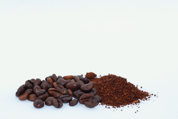 coffee beans and ground coffee center - Photo, Image