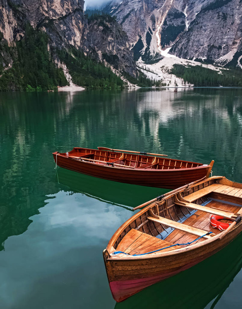 Wooden boats on the beautiful lake Braies, - Fotografie, Obrázek