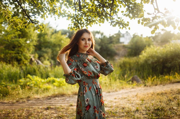 young beautiful woman posing outdoors - Fotó, kép