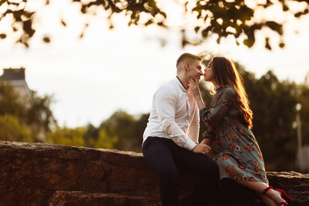 Happy beautiful young  couple kissing - Zdjęcie, obraz