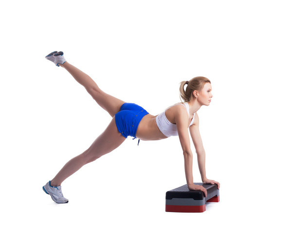 Young fitness woman with stepper - Photo, Image