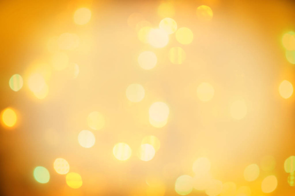 Autumn blurred bokeh background. Gold abstract background with bokeh lights - Fotoğraf, Görsel
