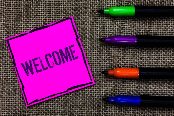 Writing note showing Welcome. Business photo showcasing Warm salutation acknowledgement for someone amiable loved thanked Marker pens art pink paper nice mat love thought black shadow memories - Photo, Image
