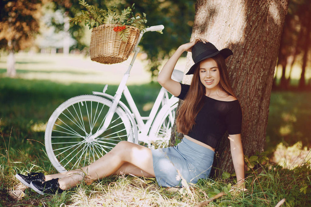 Girl with a bike - Φωτογραφία, εικόνα