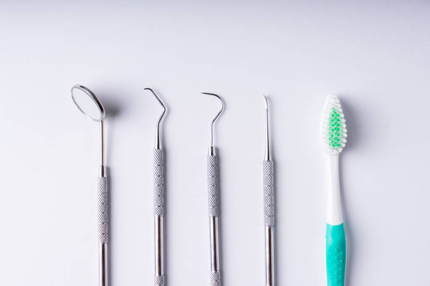 Set of metal Dentist's medical equipment tools, top view - Zdjęcie, obraz
