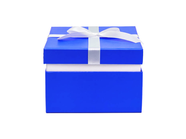Blue box with a gift and white bow isolated on white background - Valokuva, kuva
