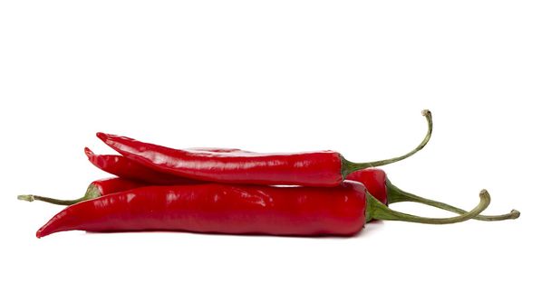 Een stelletje rode chili pepers. - Foto, afbeelding