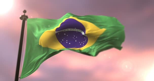 Σημαία της Βραζιλίας έγνεψε σε άνεμος στην αργή στο ηλιοβασίλεμα, βρόχο - Πλάνα, βίντεο