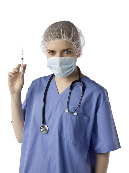 a female doctor with medical suit holding a syringe - Photo, Image