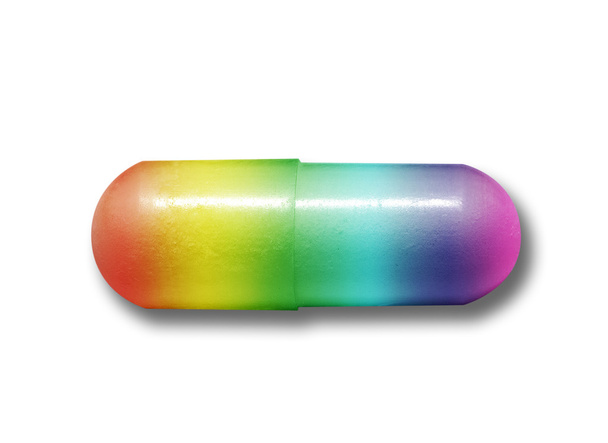 regenboog capsule van drugs op geïsoleerde Wit - Foto, afbeelding