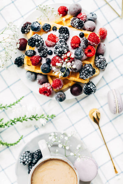 Appetizing wafers with fresh berries, cup of coffee, top view - Foto, Imagem