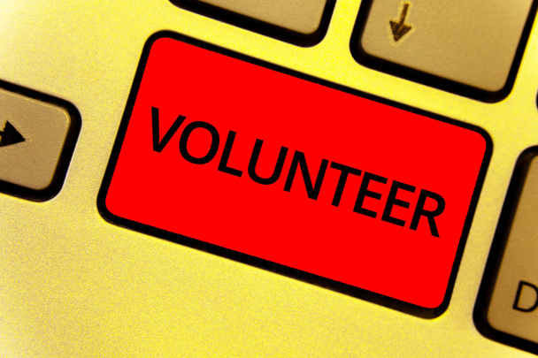 Word writing text Volunteer. Business concept for Volunteering individual for greater social cause serving others Keyboard key Intention create idea yellow computer brown keypad notebook - Photo, Image