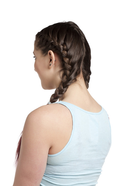 una adolescente con un pelo trenzado
 - Foto, imagen