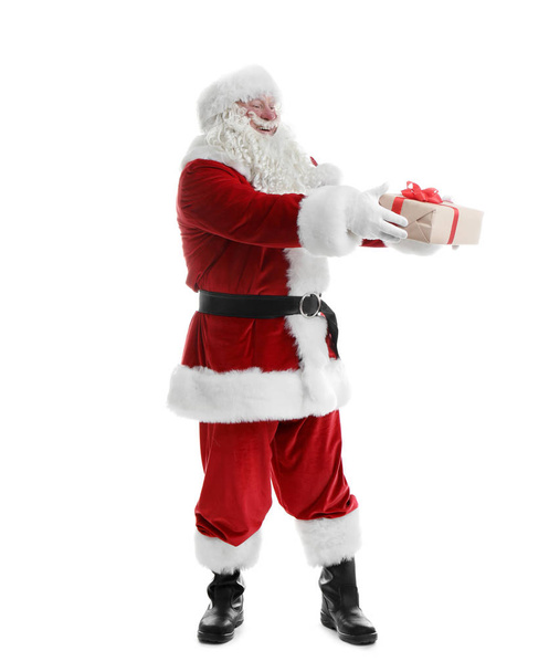 Authentic Santa Claus with gift box on white background - Photo, image