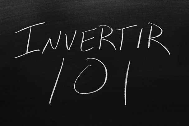 The words Invertir 101 on a blackboard in chalk.  Translation: Investing 101 - Photo, Image