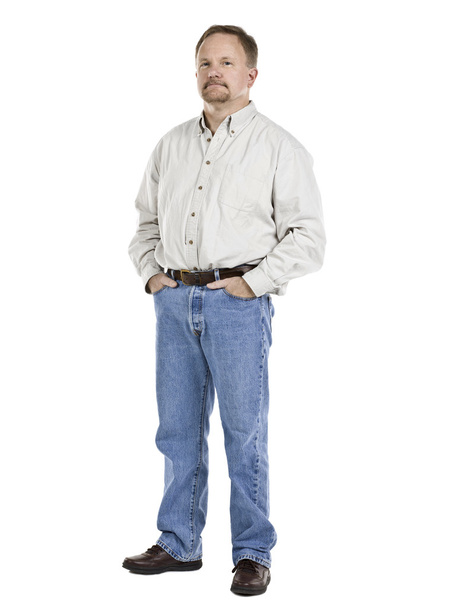 літній чоловік стоїть під рукою в кишені
 - Фото, зображення