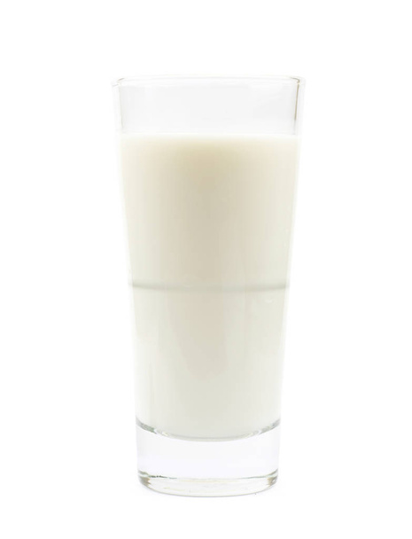Tall glass of milk isolated - 写真・画像