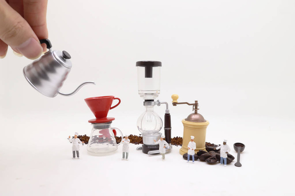 the tiny figure of Professional coffee maker  - Photo, Image