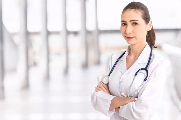 Portrait of medical female doctor on hospital background - Fotoğraf, Görsel