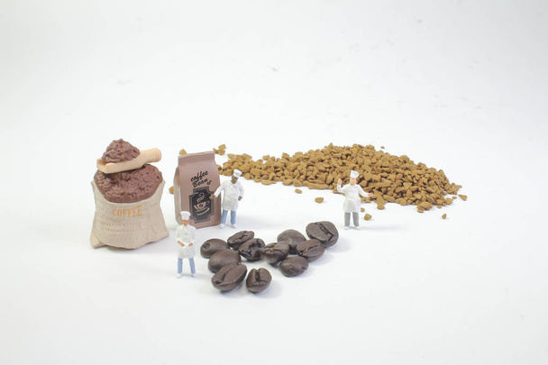 Minifiguren beim Kaffee im Makro - Foto, Bild
