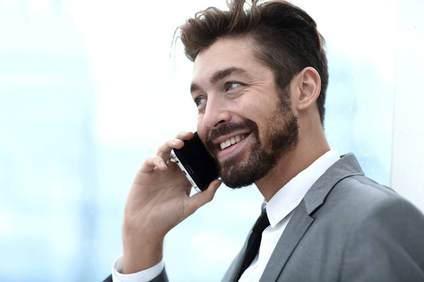 Business man talking on mobile phone - Photo, Image