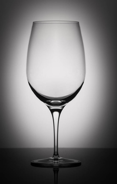Empty Wine Glass Isolated on Gray Background - Foto, imagen