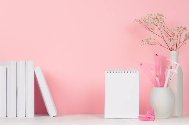 Back to school backgrounds for girl - white and pink stationery, books, blank notepad on white wood table and pink wall. - Foto, afbeelding