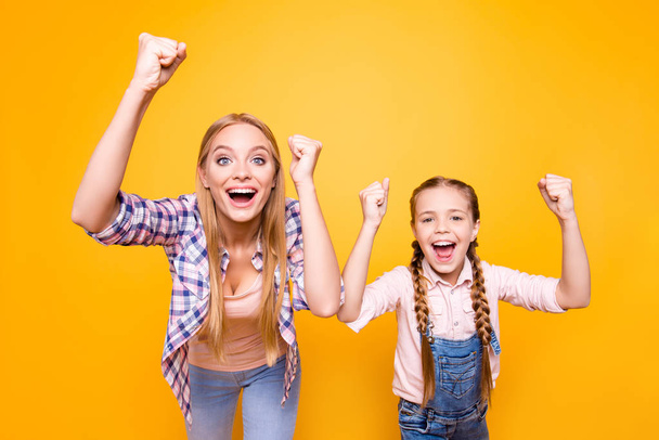 Yeah yes wow cool! Dreams come true! Different age face siblings mama mom mum mommy concept. Portrait of excited crazy joyful amazed cheerful girls with long hair isolated on bright vivid background - Fotografie, Obrázek